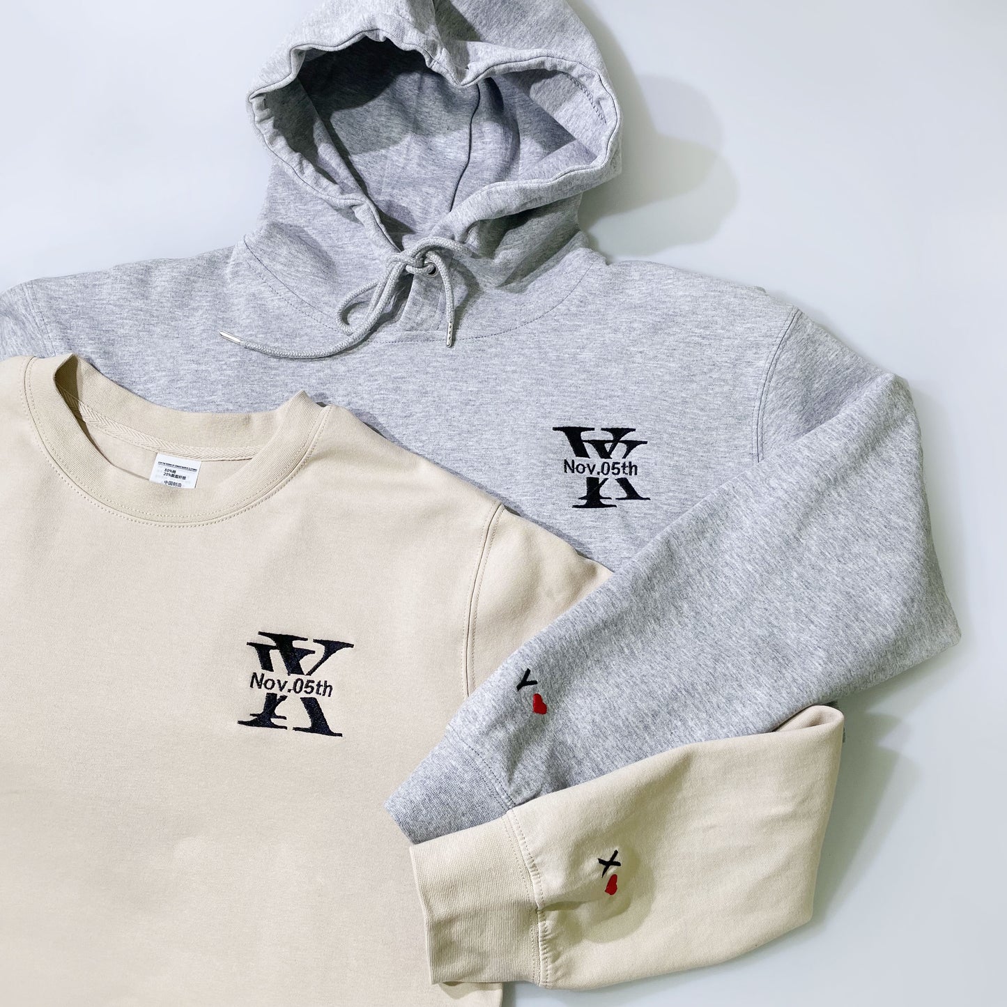 Customized hoodies with two people's initials and dates