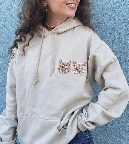 Customized sweatshirt with hand embroidered pet colored avatar